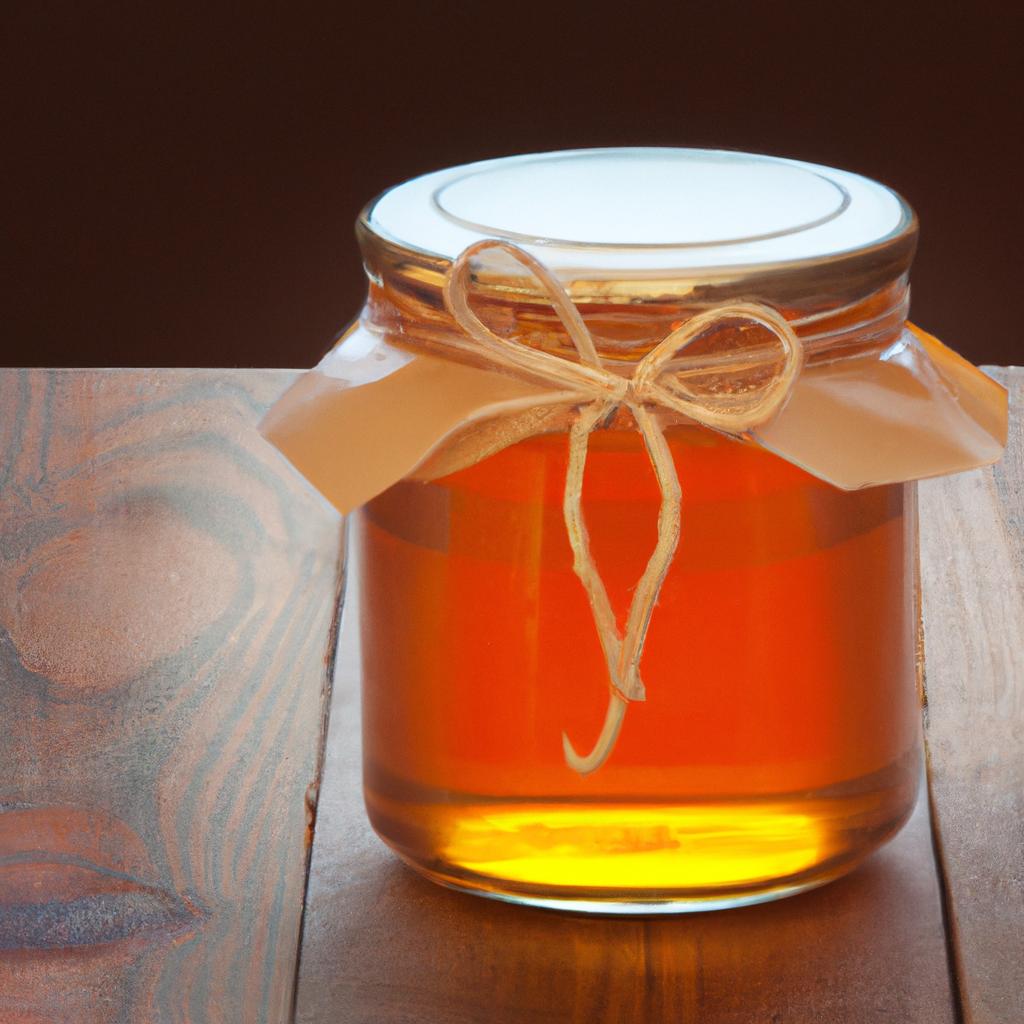 A jar of honey on a wooden table, ready to be consumed or sold